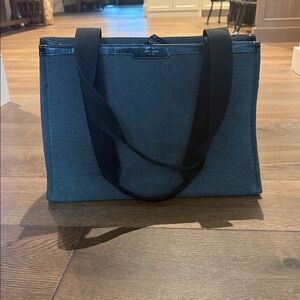 kate spade black tweed canvas laptop tote with black straps.